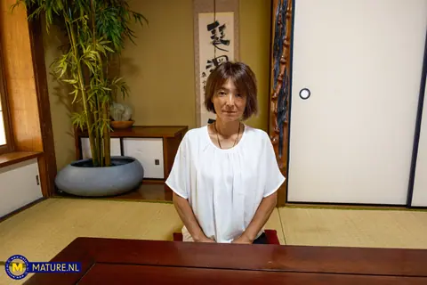 Short-Haired Japanese Woman Strips and Has Sex with Her Partner – photo 2 of 20