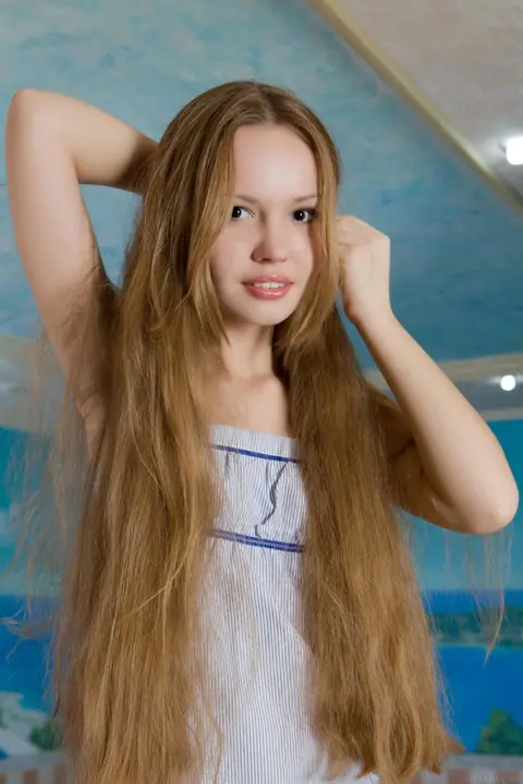 Slim Russian Redhead Undresses and Poses Nude on the Beach – photo 1 of 20