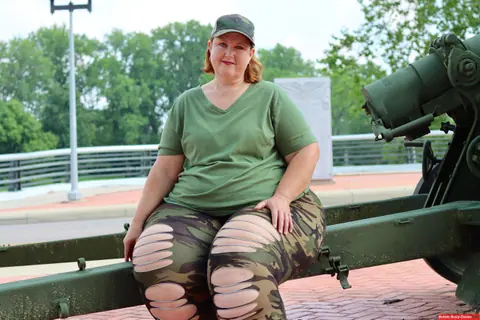 Mature PAWG Poses Outdoors on an Artillery Gun – photo 1 of 12