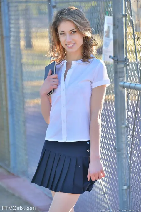 Kristen Scott: Skinny Brunette Flashes Panties in Uniform Outdoors – photo 2 of 16