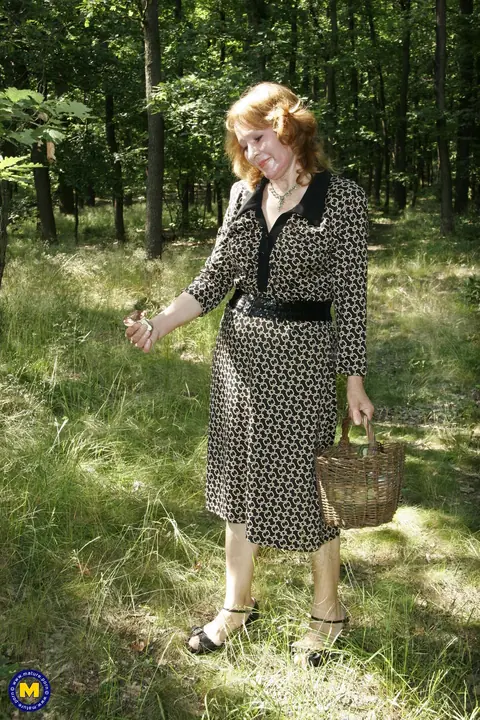 Mature Redhead European Woman Gives a Blowjob Outdoors – photo 1 of 20
