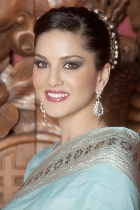 Sunny Leone: Asian Brunette MILF Strips Out of Her Dress and Spreads – photo 2 of 16