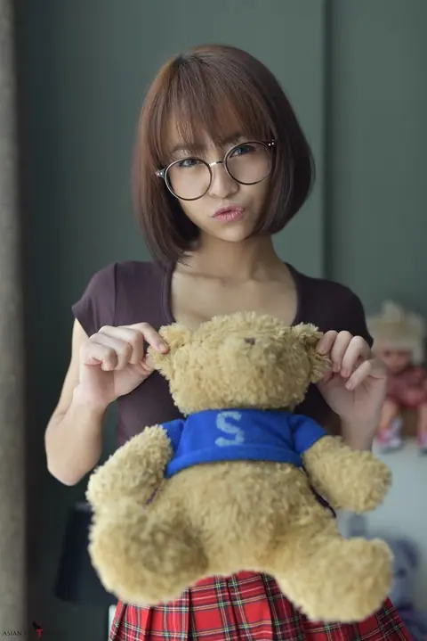 Eimi Fukada: Petite Asian Brunette Teases in a Miniskirt and Panties – photo 11 of 20