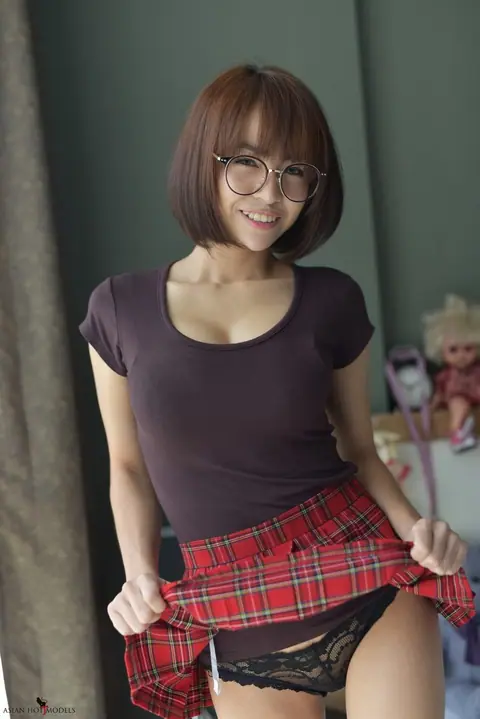 Eimi Fukada: Petite Asian Brunette Teases in a Miniskirt and Panties – photo 13 of 20