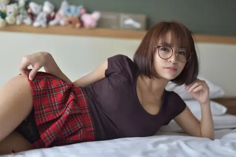 Eimi Fukada: Petite Asian Brunette Teases in a Miniskirt and Panties – photo 3 of 20