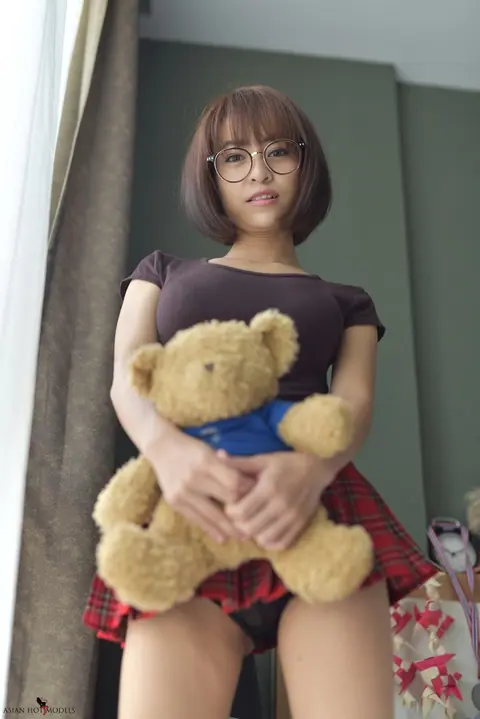 Eimi Fukada: Petite Asian Brunette Teases in a Miniskirt and Panties – photo 7 of 20