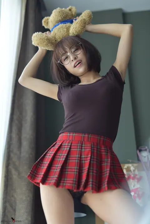 Eimi Fukada: Petite Asian Brunette Teases in a Miniskirt and Panties – photo 9 of 20