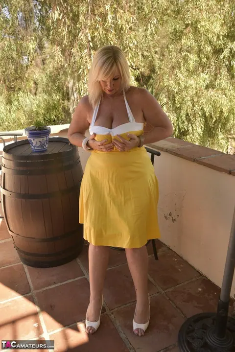 BBW Blonde Peels Off Her Dress on the Balcony – photo 4 of 16