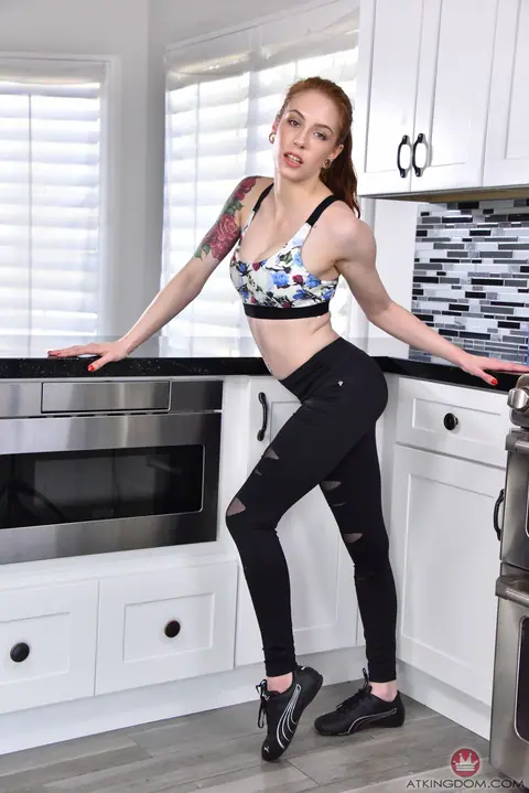 Anna De Ville: Petite Redhead Poses and Spreads Her Legs in the Kitchen – photo 2 of 21