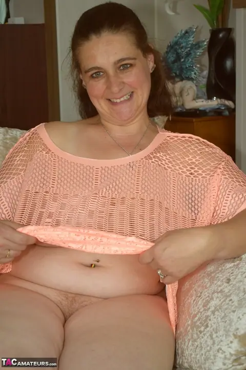 BBW Redhead in Pigtails Strips Off Her Lingerie on the Sofa – photo 4 of 16