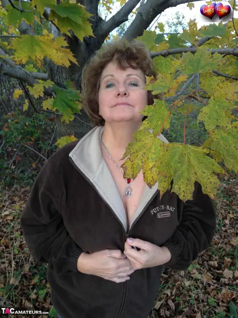 Bustybliss: Mature Curvy Brunette Undresses Outdoors Under a Tree – photo 4 of 20
