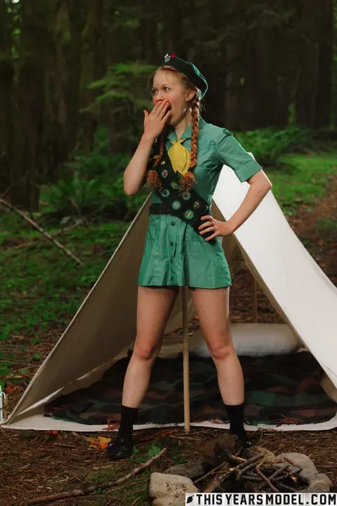 Pale Skinny Redhead in Pigtails Strips Out of Her Uniform Outdoors – photo 1 of 15