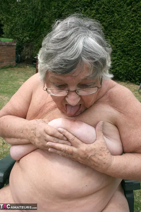BBW in Glasses Spreads Her Pussy in the Garden – photo 18 of 20