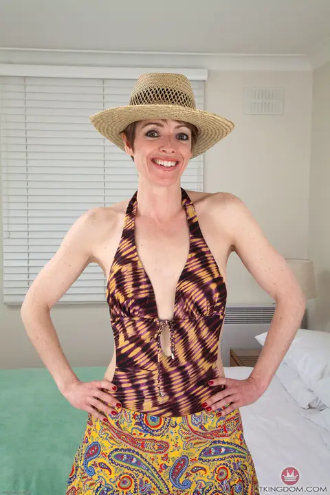 Slim MILF Strips Off Her Leopard Bikini and Spreads Her Hairy Pussy – photo 1 of 20