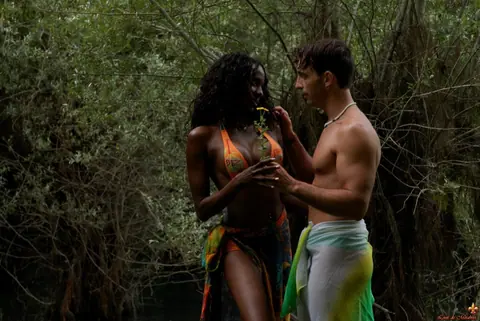 Thick Ebony Babe Shows Her Tits and Ass Outdoors Near Water – photo 1 of 16