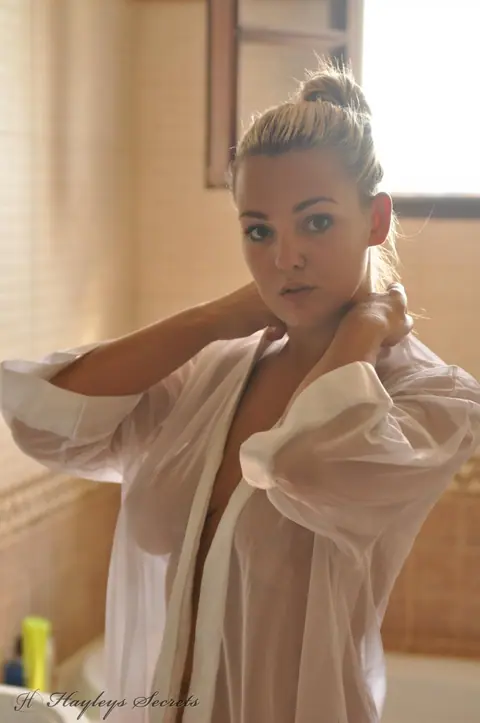 Jodie Gasson: Blonde with Big Tits Teases in a Sheer Blouse in the Bathroom – photo 12 of 12