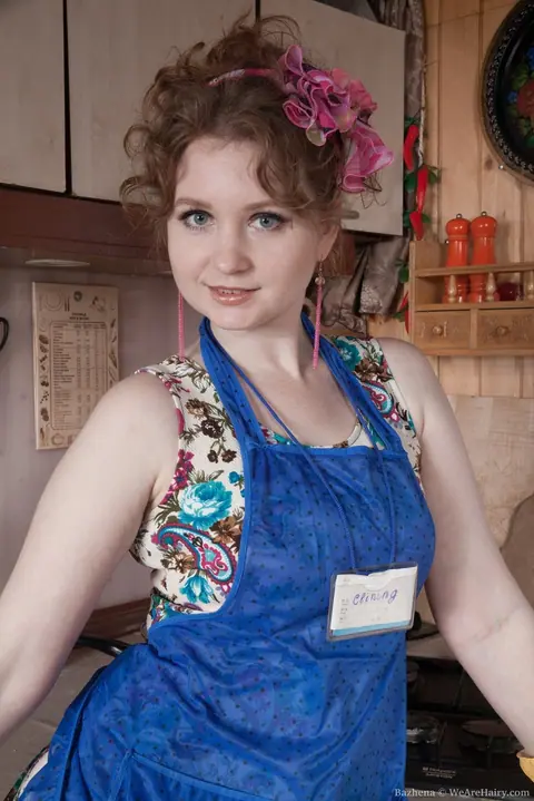 Bazhena: Curvy Brunette MILF Undresses in the Kitchen – photo 1 of 16