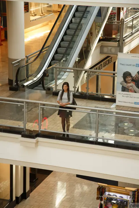 Gia Paige: Petite Brunette Shows Her Tits and Ass in Pantyhose at the Mall – photo 2 of 11