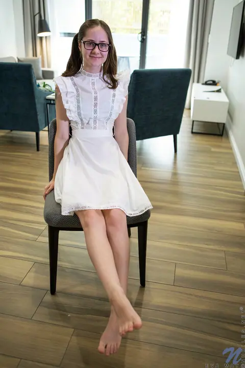 Eva May: British Brunette MILF in Glasses and Pigtails Poses Naked on a Chair – photo 2 of 16