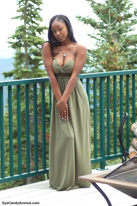 Ebony Woman Strips Off Her Dress and Shows Her Big Tits on the Balcony – photo 11 of 16