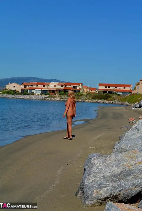 Nudechrissy: European Blonde Flaunts Her Huge Tits on the Beach – photo 20 of 20