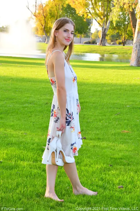 Octavia Red: Slim Blonde Amateur Flashes Her Big Tits Outdoors in a Skirt – photo 1 of 20
