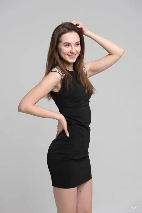 Skinny Brunette Sheds Dress to Reveal Lingerie – photo 1 of 20