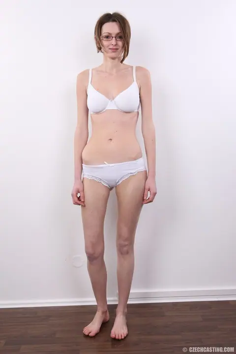 Short-Haired Busty Woman Strips Out of Her Jeans and Lingerie – photo 4 of 15