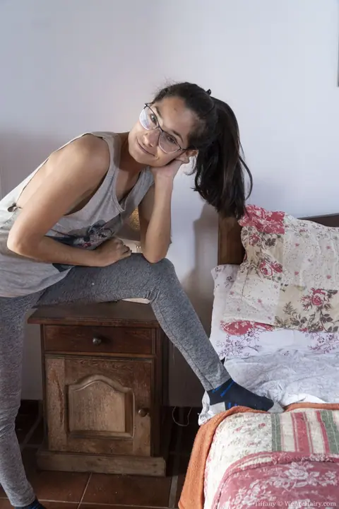 Short-Haired Woman in Glasses Spreads Her Hairy Pussy on the Bed – photo 1 of 20