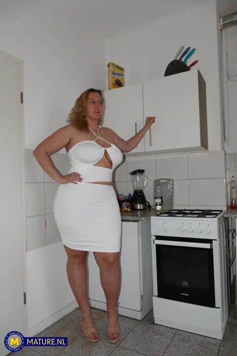Curvy Russian MILF Sucks and Fucks Doggy Style in the Kitchen – photo 1 of 20
