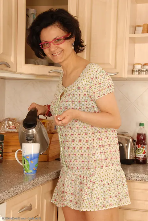 Brunette MILF in Heels and Glasses Flaunts Her Big Tits in the Kitchen – photo 2 of 20