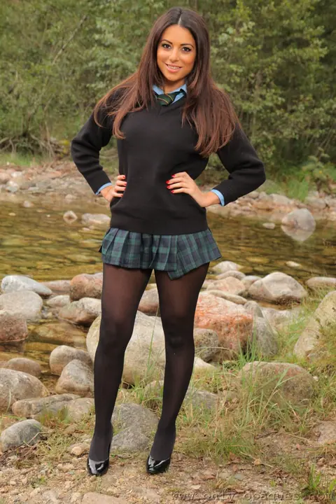 Charley S: Busty Brunette Strips Out of Her Pantyhose by the River – photo 1 of 20