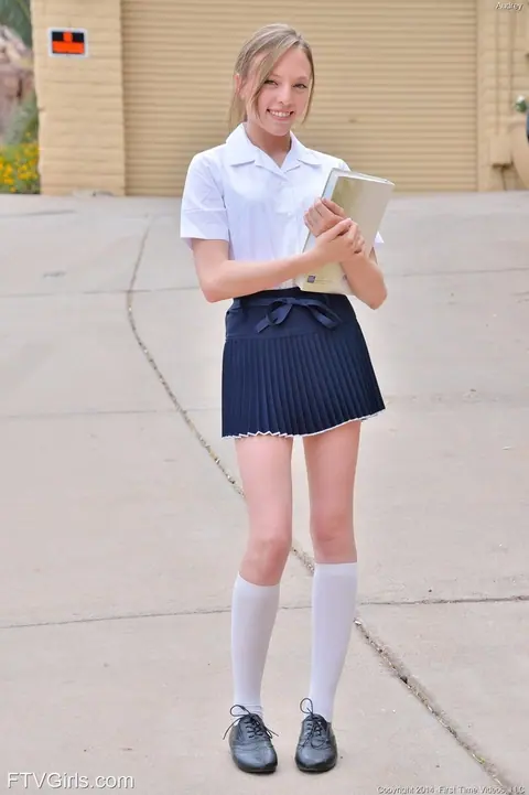 Aubrey Star: Skinny Blonde in a Skirt and Socks Spreads Her Pussy – photo 1 of 16