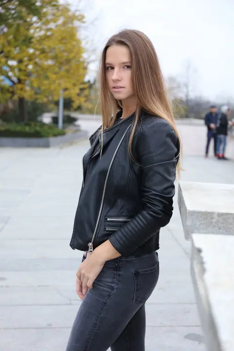 Vanessa Mio: Woman in Leather Boots and Jeans Strips Outdoors – photo 12 of 20