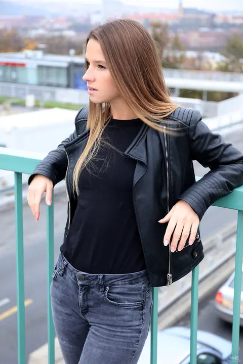 Vanessa Mio: Woman in Leather Boots and Jeans Strips Outdoors – photo 5 of 20