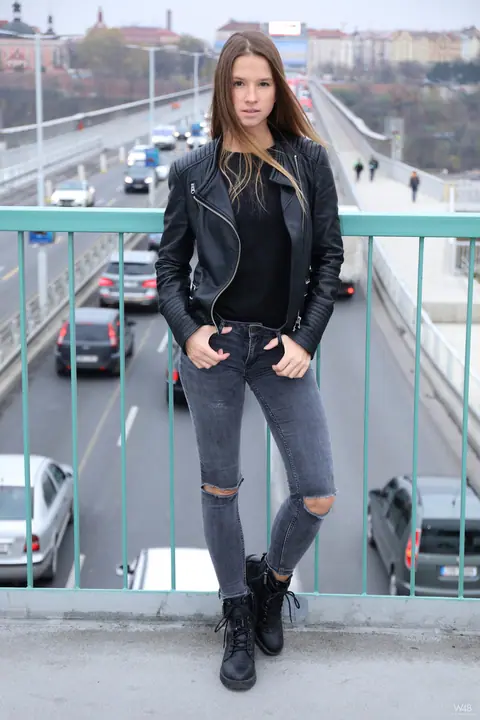 Vanessa Mio: Woman in Leather Boots and Jeans Strips Outdoors – photo 6 of 20