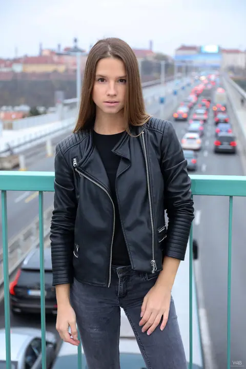 Vanessa Mio: Woman in Leather Boots and Jeans Strips Outdoors – photo 7 of 20
