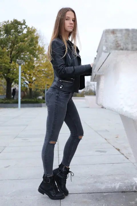 Vanessa Mio: Woman in Leather Boots and Jeans Strips Outdoors – photo 9 of 20