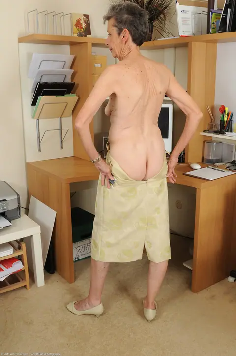 Skinny Mature Secretary Strips Out of Her Uniform in the Office – photo 12 of 20