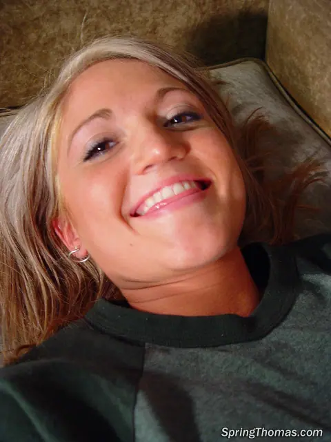 Spring Thomas: Busty Blonde Strips Naked and Spreads Her Shaved Pussy on the Sofa – photo 9 of 18
