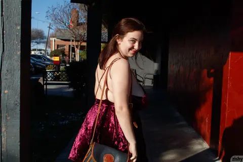Milly Marks: Chubby Brunette Lifts Her Skirt Outdoors and Shows Her Natural Tits – photo 1 of 12