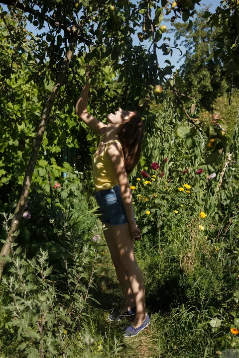 Katya Timakova: Petite Russian Redhead Strips Off Her Shorts and Panties in the Garden – photo 4 of 11