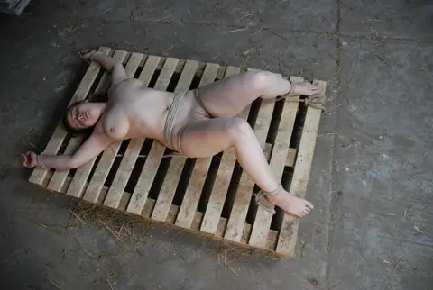 Busty Naked Slave Chained and Spreads Her Pussy Wide – photo 6 of 16