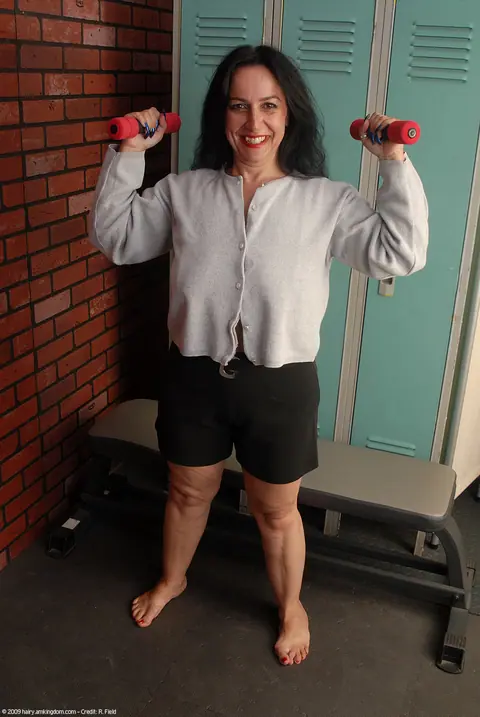 Nina Swiss: European Brunette MILF Strips Out of Her Shorts – photo 1 of 20