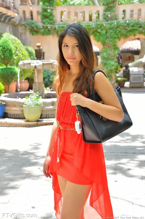 Melody Wylde: Asian Brunette in a Skirt and Heels Flashes Her Shaved Pussy Outdoors – photo 1 of 15