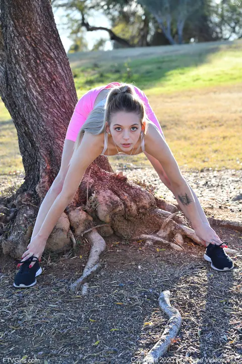 Lily Larimar: Petite Pale Blonde Toys Herself Outdoors – photo 3 of 20