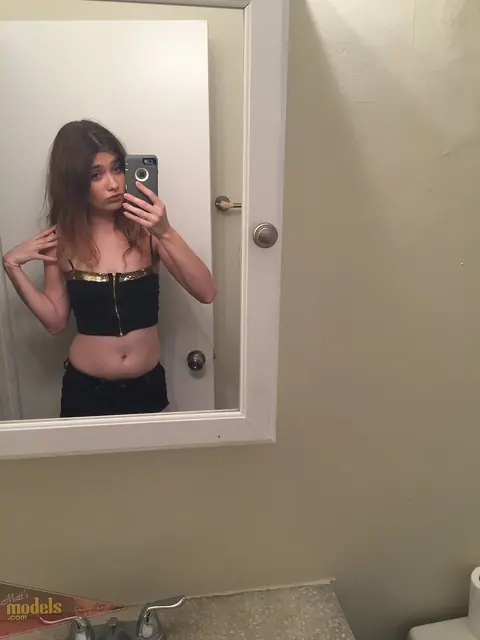Ariel Mcgwire: Petite Brunette Strips Out of Her Shorts in the Bathroom – photo 4 of 16
